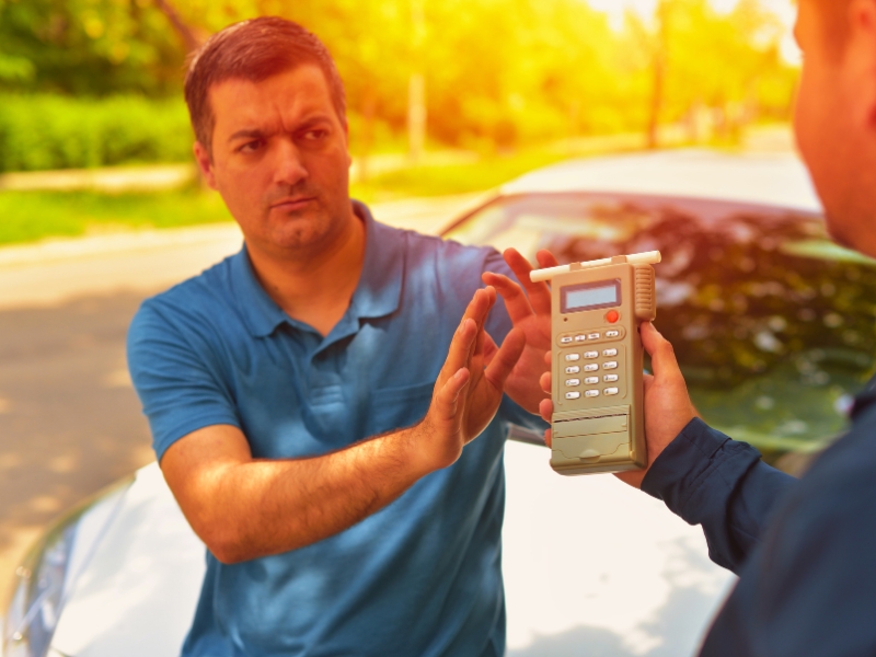 Driver due to being subject to test for alcohol content with use of breathalyzer