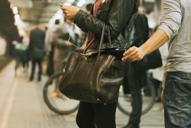 Thief stealing wallet at the subway station