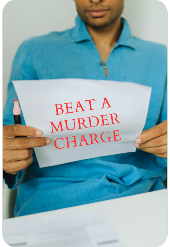 man holding a paper that says beat a murder charge