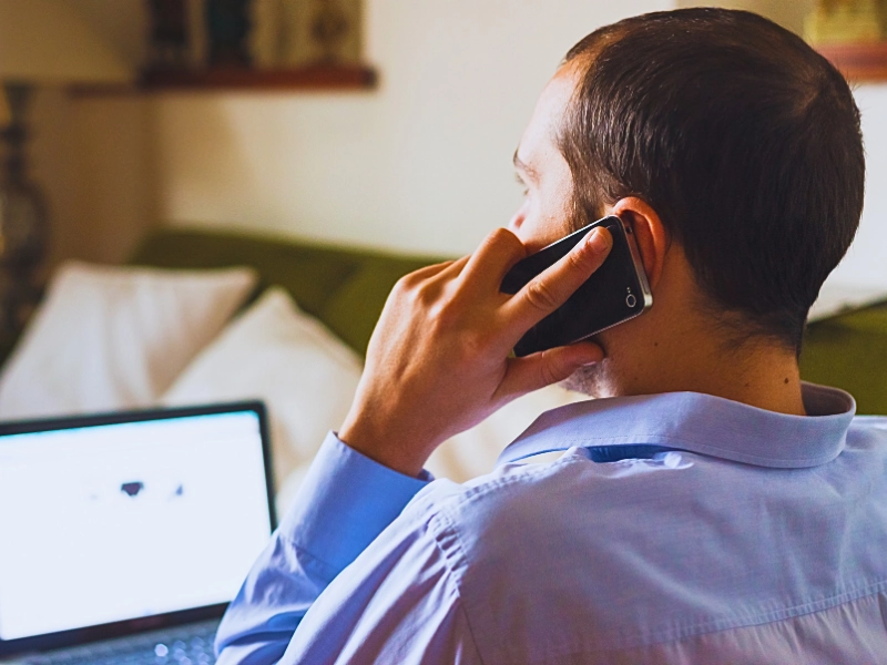 What Happens if You Contact the Alleged Victim After Charges Are Filed in Minnesota? 1 Man on a phone call while using a laptop. Contact the Alleged Victim After Charges